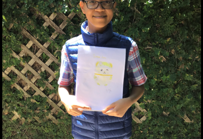 Myles with his winning drawing from the art contest!